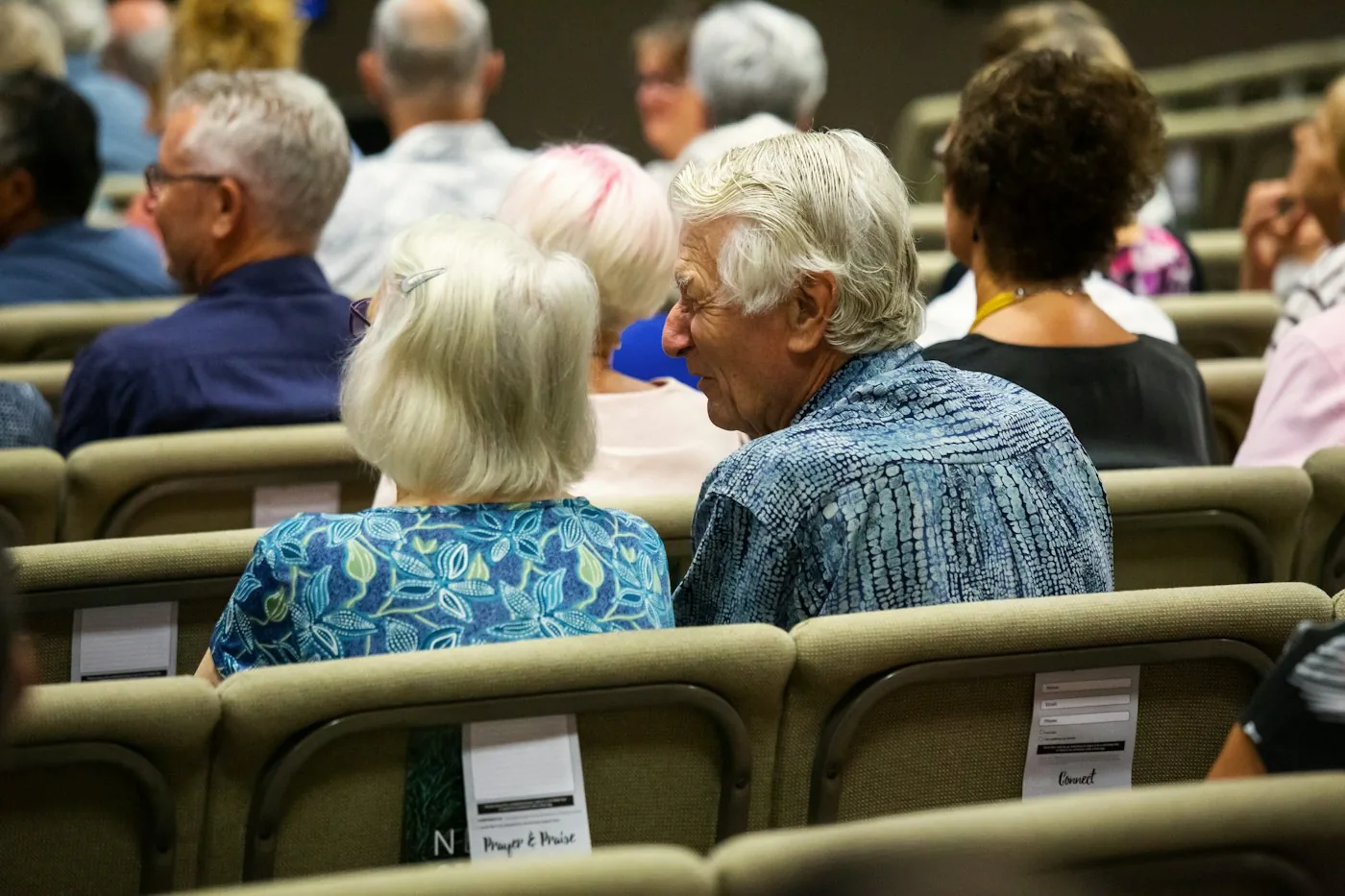 People sitting together in a community room